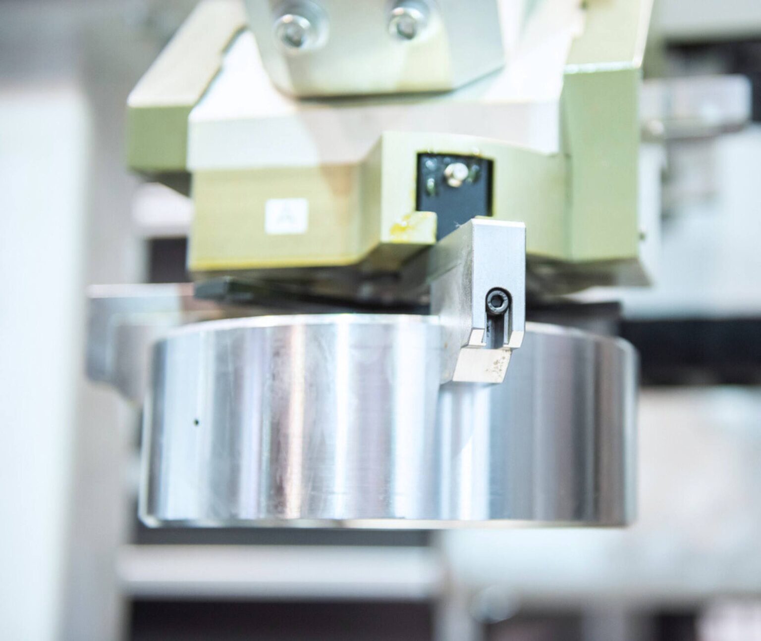 Okuma Gantry Loader (OGL) gripper holding part