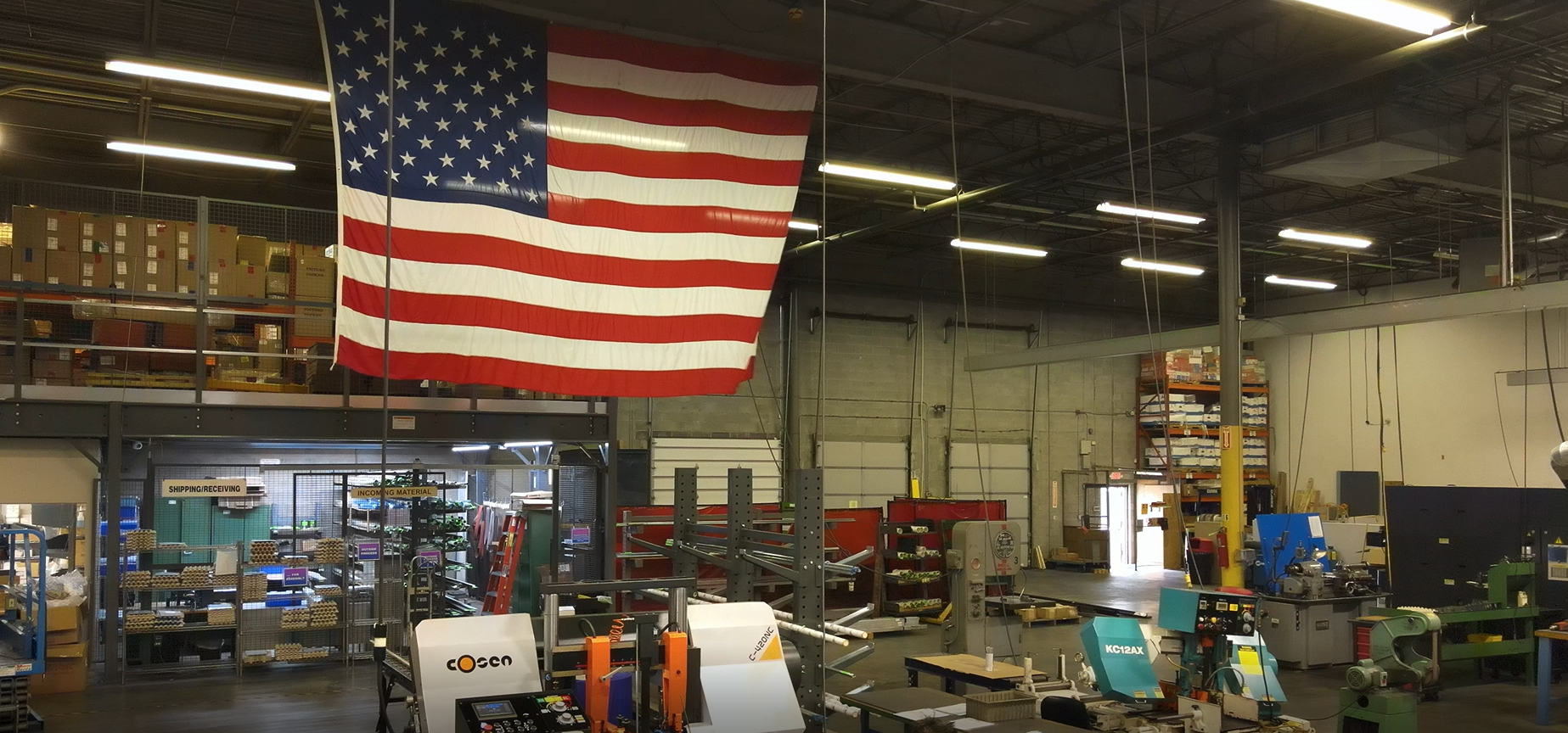 machine shop with American flag hanging