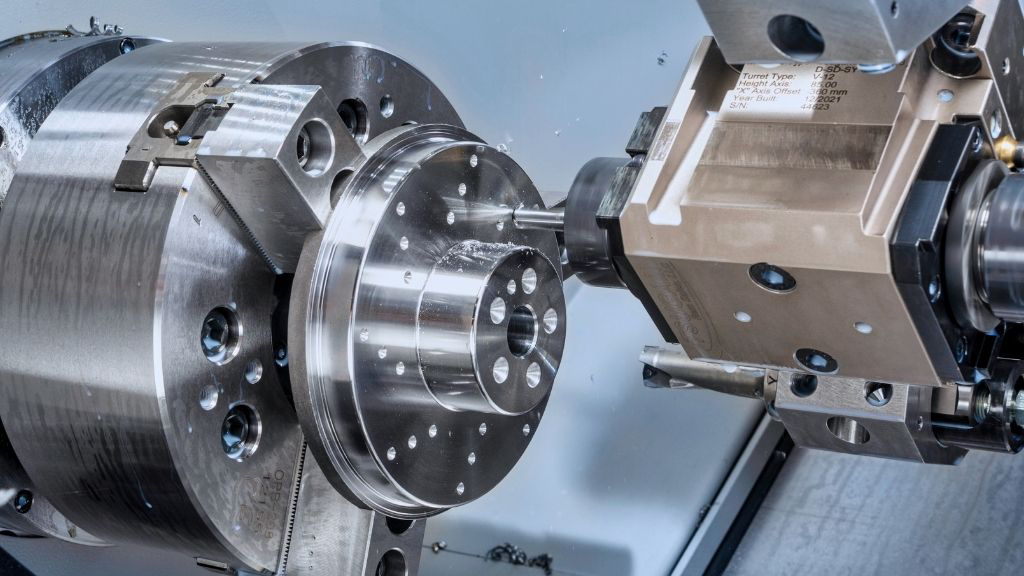 CNC turning center machining a precision component